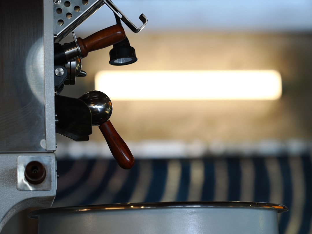 close-up-of-a-coffee-roasting-machine-with-wooden-handles-q7qzox3crce