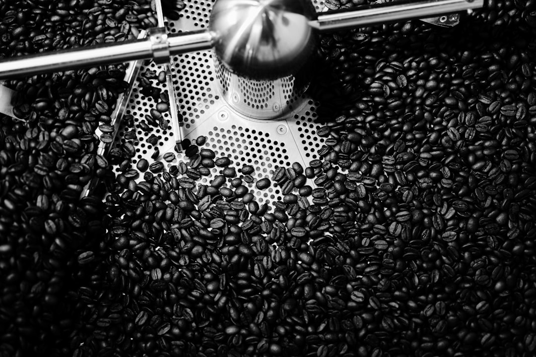 watching, smelling and experiencing coffee roasting process at Umbra Coffee, Makassar, Indonesia