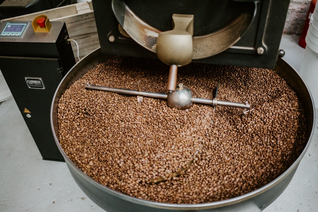 coffee-beans-in-a-roaster-machine-u0h8dqtmtpy